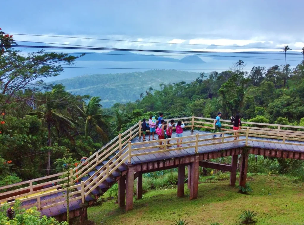 Picnic Groove with a bridge and a view of taal lake and volcano